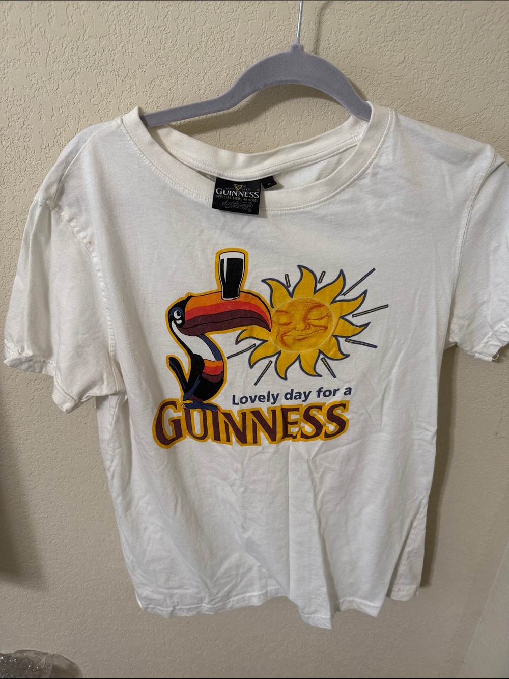 Guinness White Short-Sleeve Tee with Colorful Toucan & Sun Graphic